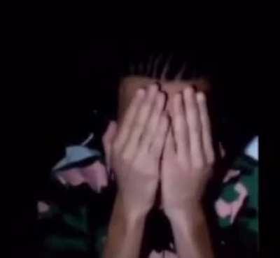 Cat jumps on man while he plays a horror game