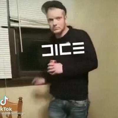 Guy dropping a TV (or some electronic device) out of the window and rolling down the blinds.