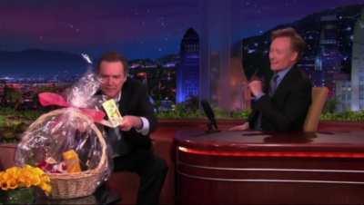 Norm Drops off a Gift Basket [2010]