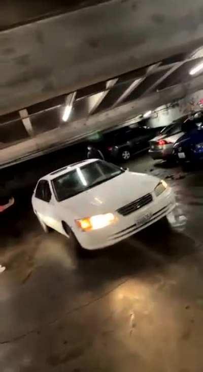 Trashy chicks cause absolute mayhem in a downtown parking lot skirmish