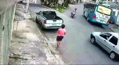 Reckless motorcycle rider with no gear.