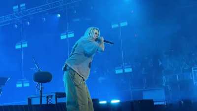 Emily smirking as she literally sings 