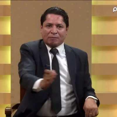 Assume you don't know who this person is or what he's talking about; what do you believe he's up to based on this clip?