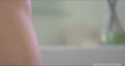 Aidra Fox bending over.