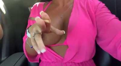 Smoking a joint , driving the R8 with my boob out flashing everyone driving by