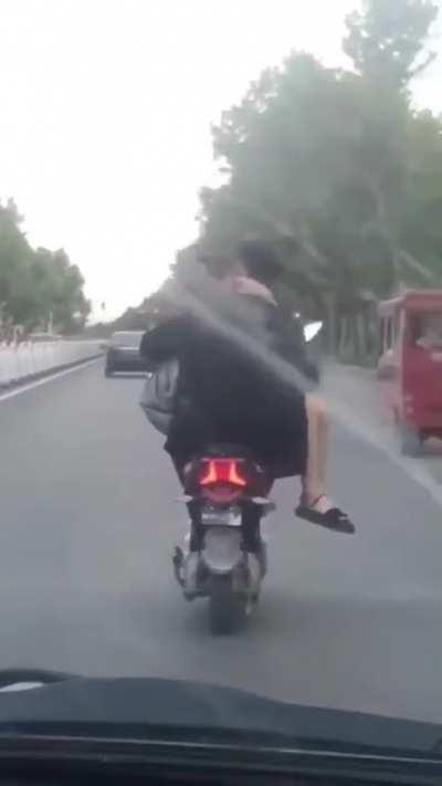 No PDA please, especially when you're riding a bike