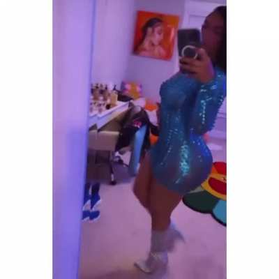 Queen Naija ass cheeks and nipples in see thru dress