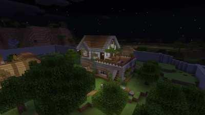 I’ve been working on a town/ base to eventually bring my villagers into once it’s safe enough. What do you guys think? (Survival)