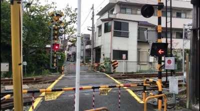 Train crossing somewhere in Katsushika, Tokyo.