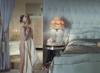 Amy Adams coming out after a bath - from Miss Pettigrew lives for a day. 