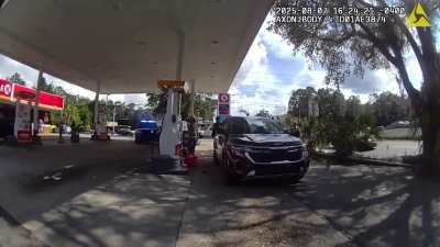 Cop draws gun on tattooed man at gas station after mistaking pump nozzle for pistol