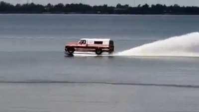 Farm truck boat on water