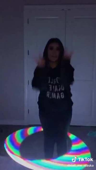 Dancing while Hula Hooping