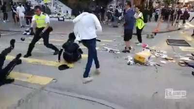 Chinese Lawman upholds order in th' face of a hoard of Weimarican funded ruffians. 🇨🇳🇨🇳🇨🇳💪💪💪