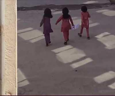 10 years old Iranian girls take off their mandatory hijab and shout “Women, life, freedom”.