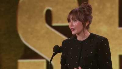 Elizabeth Olsen accepting the MTV Movie and TV Award for 'Best Performance in a Show' for her role as Scarlet Witch in 'WandaVision.'