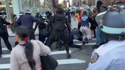 Lady gets swarmed after swatting a Police camera.