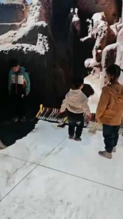 Trying not to fall over in a 3D wrap around visual booth.