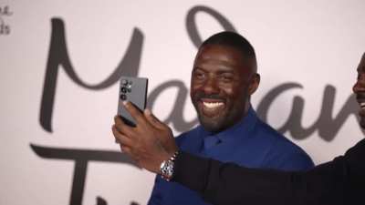 Idris Elba's Madame Tussauds Wax Figure Opens his Phone with Face ID