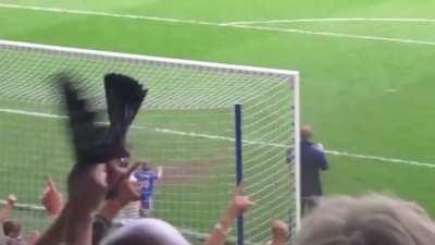 Happy freak out as everybody erupts in applause when a toddler performs some wicked ball handling and scores.