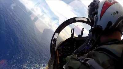 Pilot trying to land on aircraft carrier