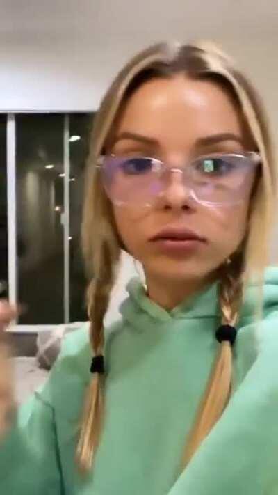 Madi Teeuws - Green Hoodie and Glasses