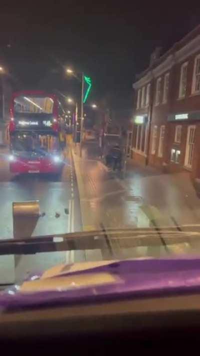 Crazy man slamming trash bins.