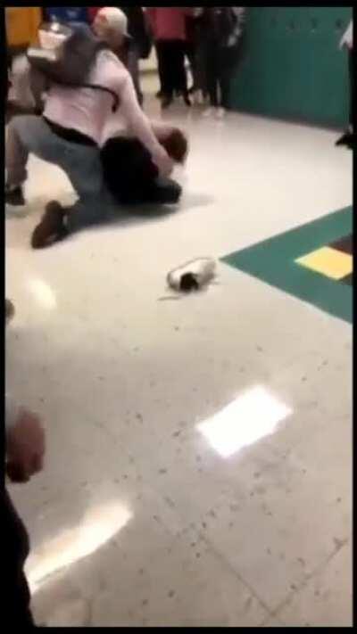 (Edited the 3 videos together) Highschool beatdown. Guy on the ground shit-talked the guy with the hat, then slept with his gf. Hat dude was not happy.