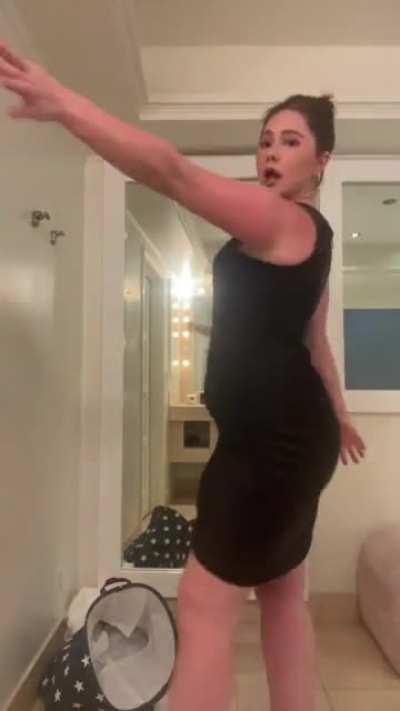 Emma looking damn fine in her black dress