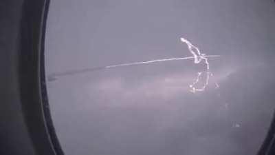 Lightning striking a plane wing (xpost from thatsinsane)