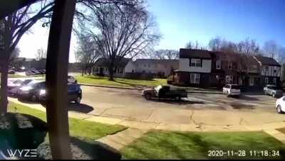 A Woman Uses Defensive Driving While Narrowly Escaping A Hitman