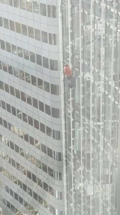 Just some guys casually climbing a skyscraper without any safeties (there was a second one which I didn't get on this video)