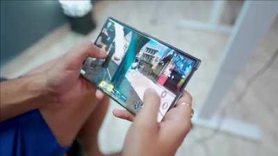imagine playing cod mobile on OPPO X 2021 (rollable screen)