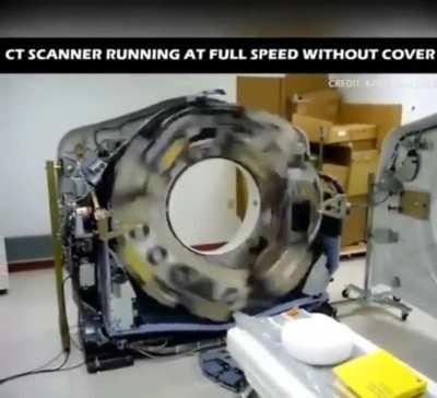 CT scanner running at full speed without a cover.
