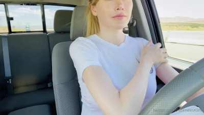 Taking bra off while driving at high speed without hands on steering wheel