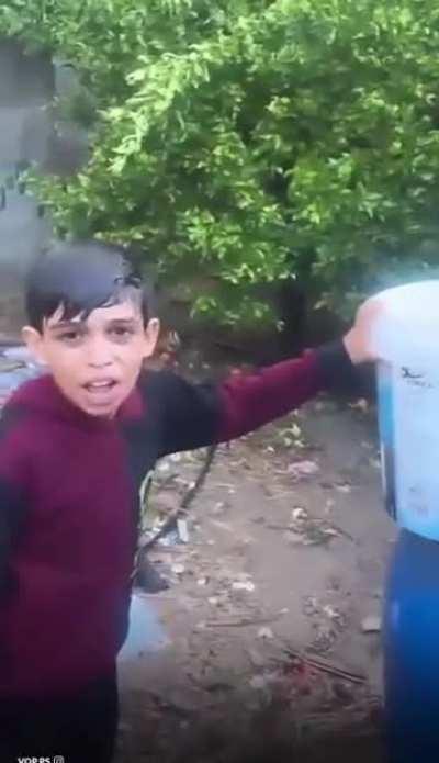 Gaza children rejoice in rainwater after Israel kept them thirsty.