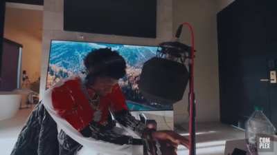 NBA Youngboy recording a song
