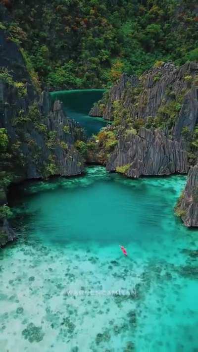 Kayaking in a lagoon, located in Coron Palawan, Philippines