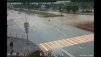 Driver in Kazakhstan runs over a pedestrian and rips his leg off.