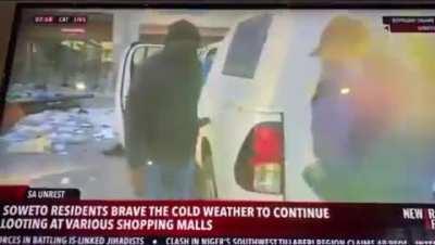 To arrest someone during the riots in South Africa while on live tv.......