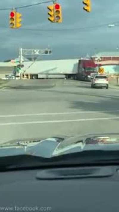 Truck get stuck on tracks, different angle.