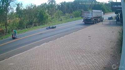 This biker tries to show off and runs into a Truck.