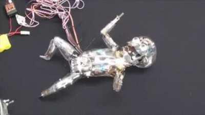 Robot resembling human infant