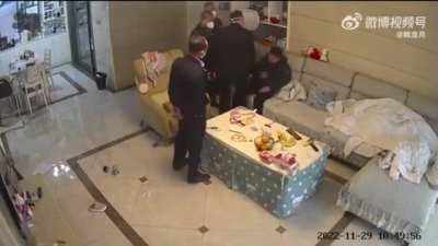 This video just set China's internet on fire. A father of two requested authorities not seal the gates to his compound, with the tragedy in Urumqi fresh in mind. His refusal to budge causes the guards to assault him in his own home. I have no words.