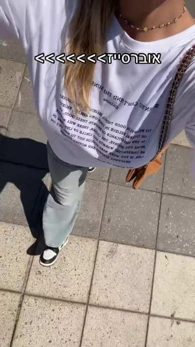 Strutting her stuff, too busty too hide ...