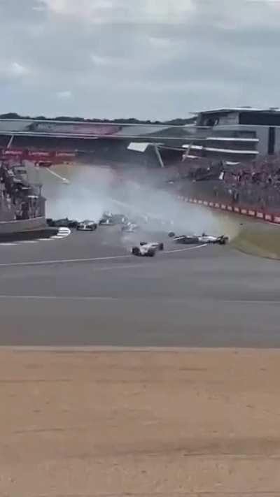 HUGE crash during the F1 race in Silverstone - Drivers and crowd are OK