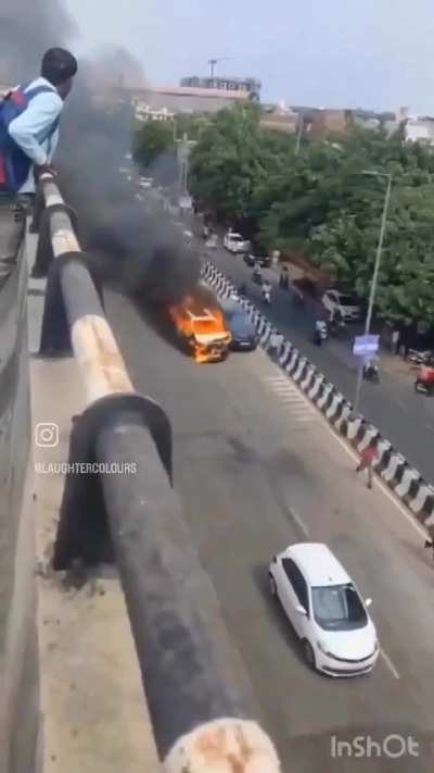 A burning car starts to drive on its own and two different cameras follow the action pretty well. 