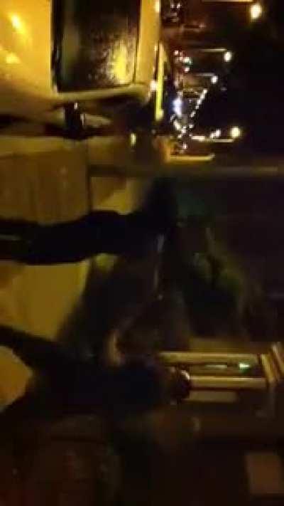 ITS CURTAINS. Drunk dude talked shit across the street and found a sober guy 3x his size. Teeth on the ground everywhere.