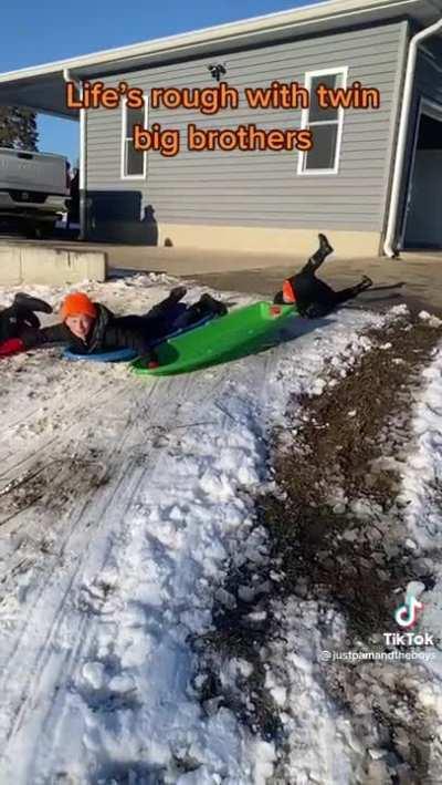 Little brother will learn the hard way... to run faster and keep up!