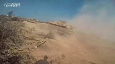 Hamas combatants plant explosive charge on merkava tank and hit a second tank with a TANDEM RPG round